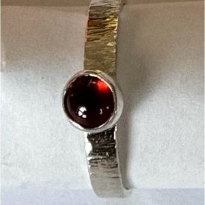Garnet ring, sterling silver,size 7.75, 3.04 mm width.